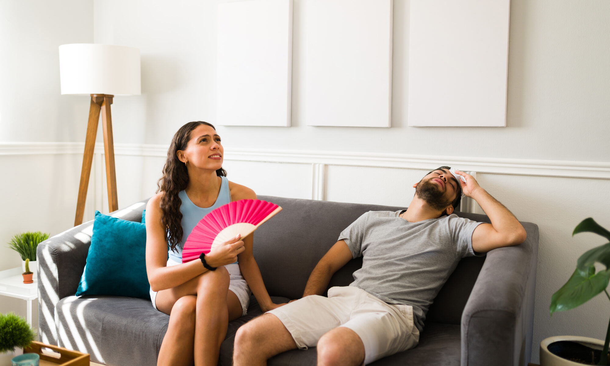 A couple in a hot livingroom